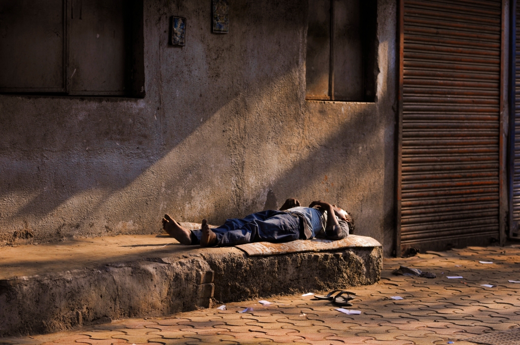 Sleeping man in Mumbai, India - Your Shot - National Geographic Magazine -- Kristian Bertel
