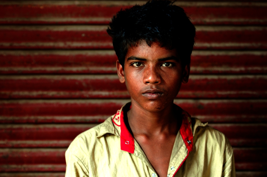 Photo of a boy in Chor Bazaar in Mumbai, India.