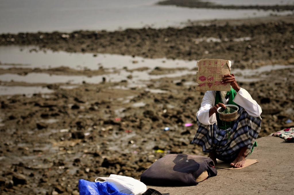 Photo of a beggar in Mahalaxmi West in India.