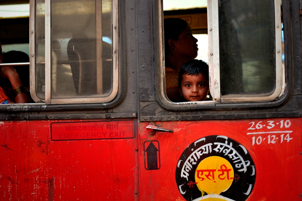 Photo of an Indian child in a bus in India.