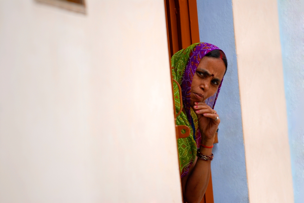 Woman at a door, India - Your Shot - National Geographic Magazine -- Kristian Bertel